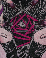 Close up of summoning circle center. A creatures eye peaks through bandage like binds.