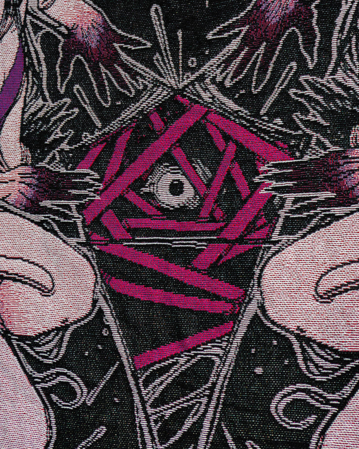 Close up of summoning circle center. A creatures eye peaks through bandage like binds.