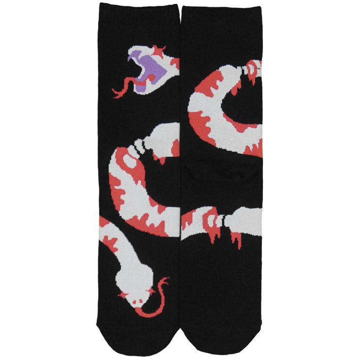 Black background, white double headed snake with red spots, wraps around from toe to leg. Body has been sliced, with bones showing. Top snake purple open mouth and bottom snake has closed mouth.
