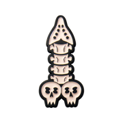Phallic spine bone with the tail bone at the top, two skulls sit at the bottom.