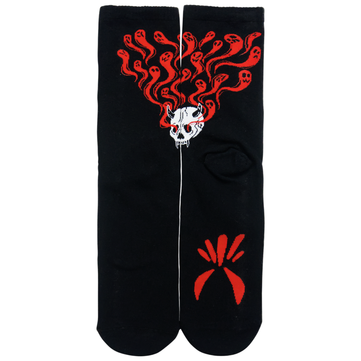 Black socks with a skull on the leg with ghosts flying out of its eyes. A ghoul face on the bottom of the sole.