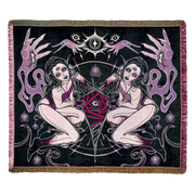 Two identical women, one smiling, one somber, with black hair on a summoning circle, with a creature peaking through. Ghostly hands, and lit candle surround them. Black, white, and purple tones.