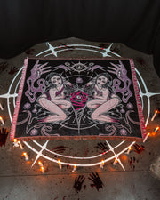 Seance spread on floor, on top of a summoning circle.