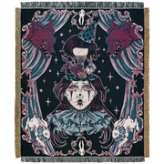 Woman with long dark hair wearing a ruffled collar, and sad clown makeup, and a coned hat. Her head splits, opening to a carousal which shows a wolf chasing a rabbit.  Two snarling wolf heads and rabbits with ruffled collars flank her in front of draped curtains, and an ornate frame that borders the design.