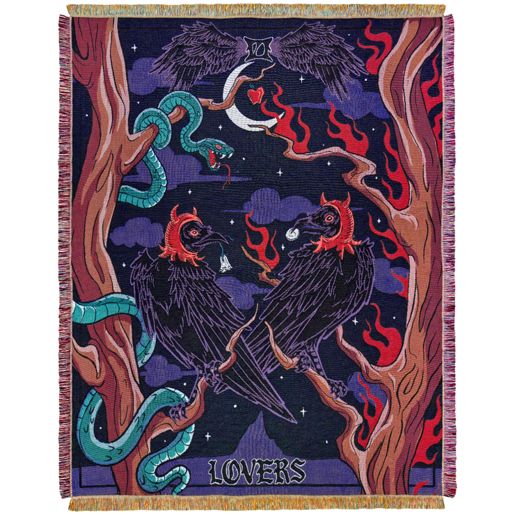 Two crows in devil bonnets holding a flower and coin perch on branches. A snake coils on one tree, flames rise on the other, under a crescent moon.